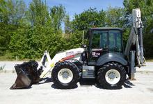 Экскаватор погрузчик Terex 970