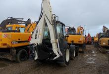 Экскаватор погрузчик Terex 860